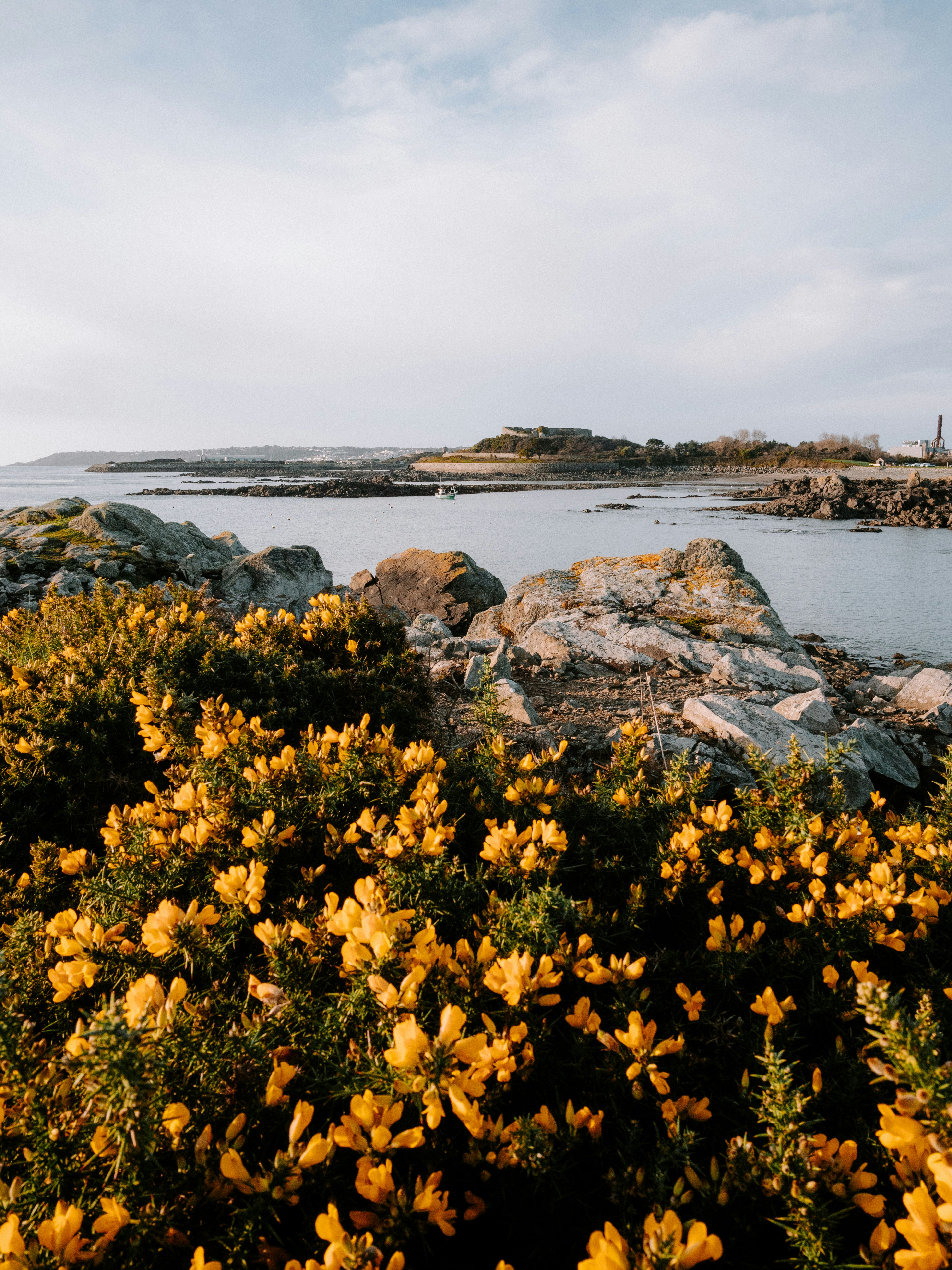 View of Vale Castle in Guernsey with the power station in the background