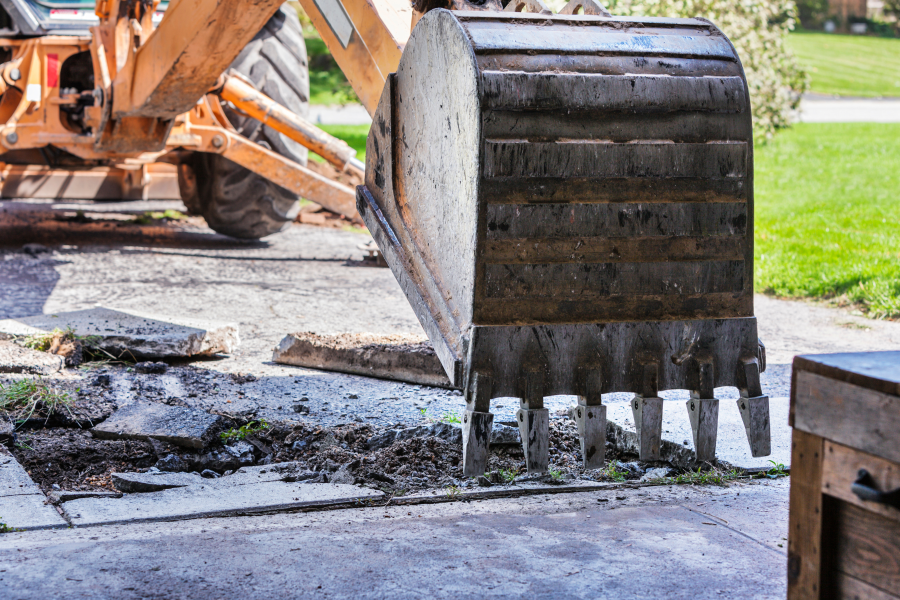 Driveway excavation for supply line cables